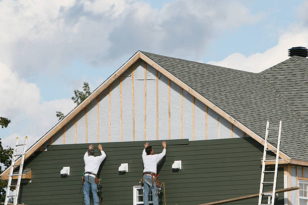Professional Siding Repair technician working in Brookville, NY